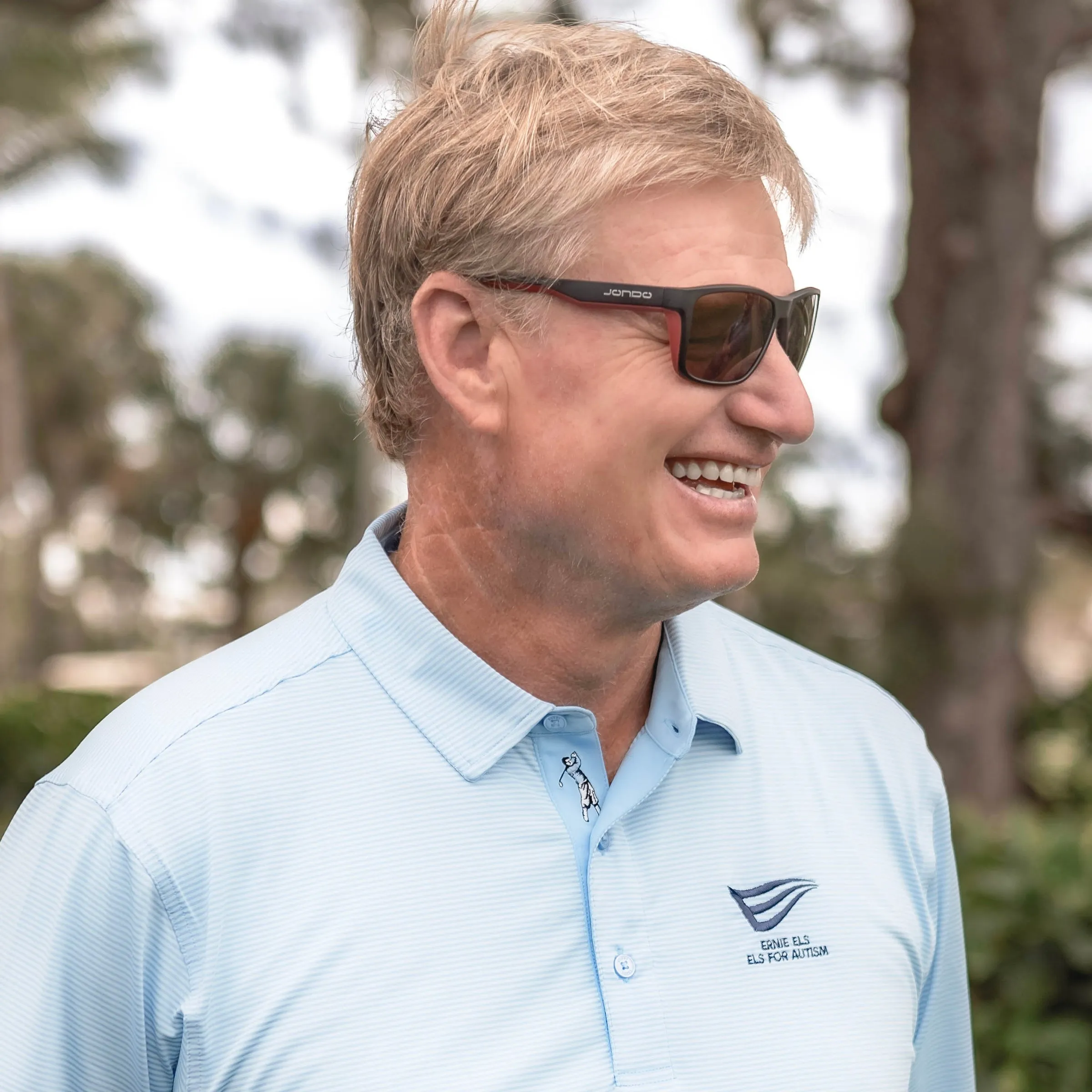 Ernie Els wearing JondoSport Club Champ sunglasses on the golf course