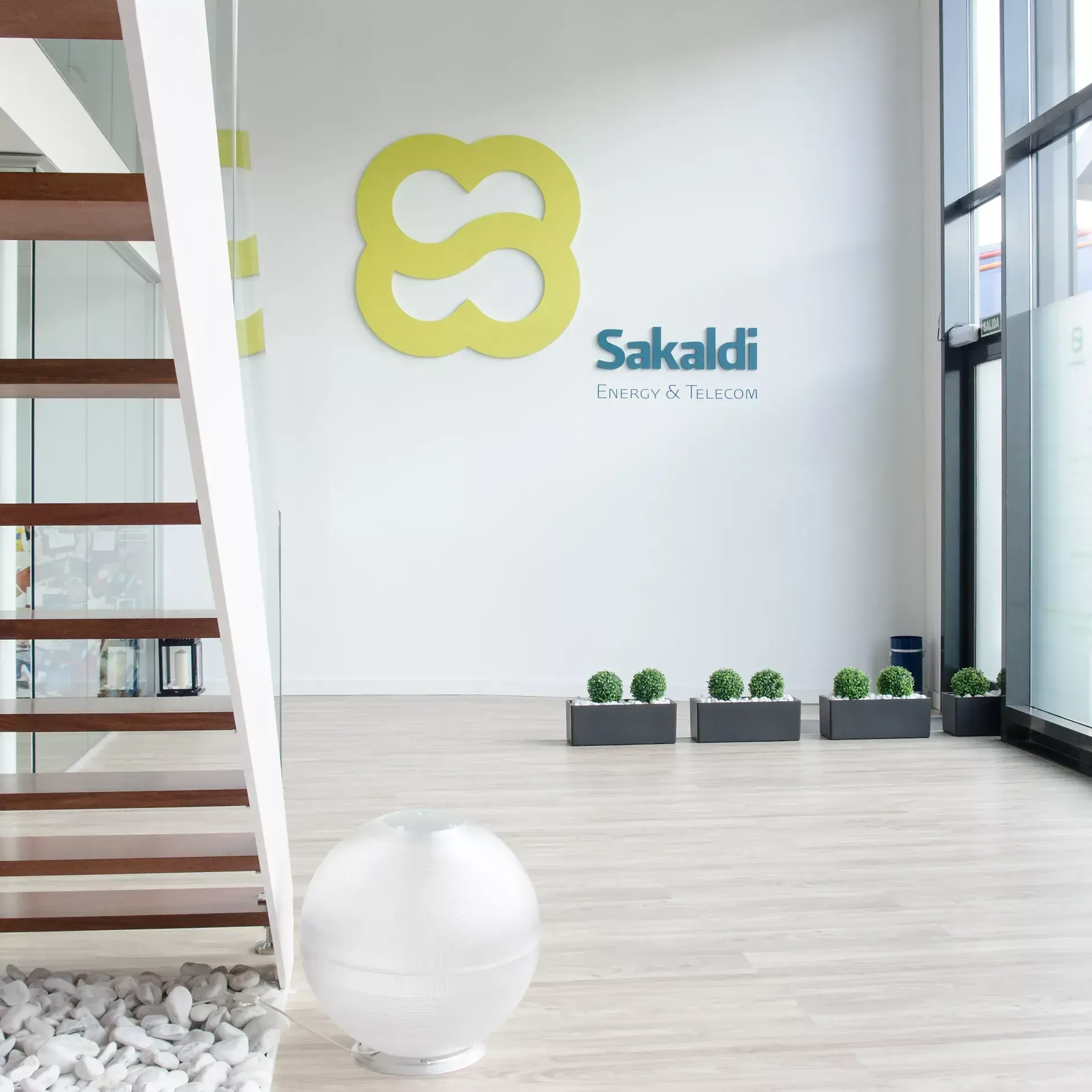 Sakaldi Energy & Telecom office lobby with the branded logo mark displayed on the wall