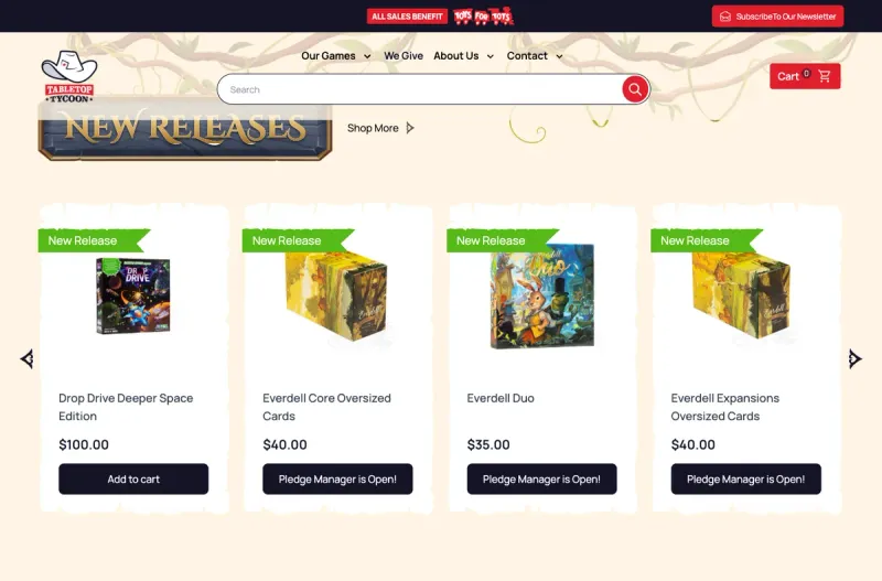 The redesigned tabletoptycoon.com: vine artwork across a cream header, a wooden New Releases sign, and torn-paper product cards with Pledge Manager buttons